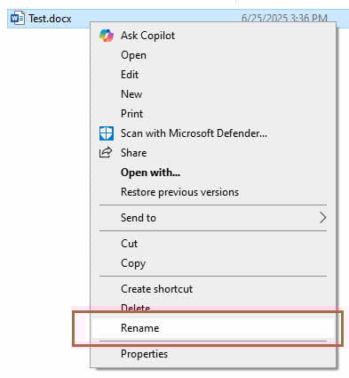 Change file extension in Windows File Explorer.